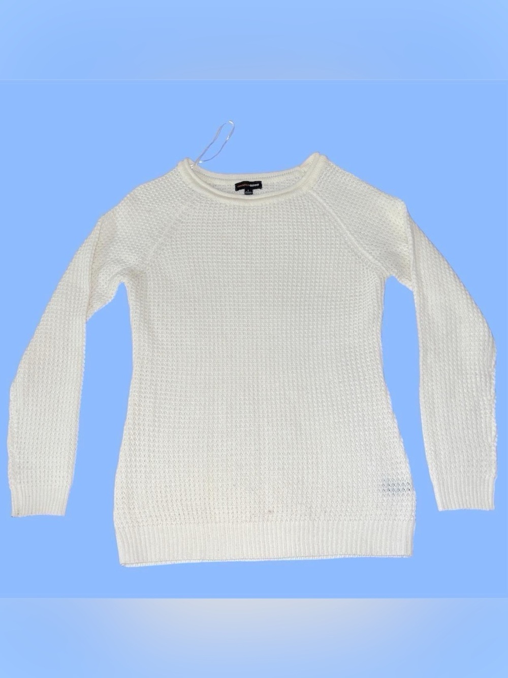 Cream Waffle knit sweater.